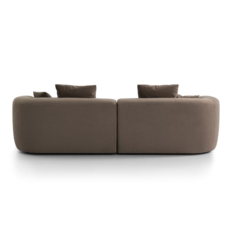 Brown sofa with two cushions on a white background