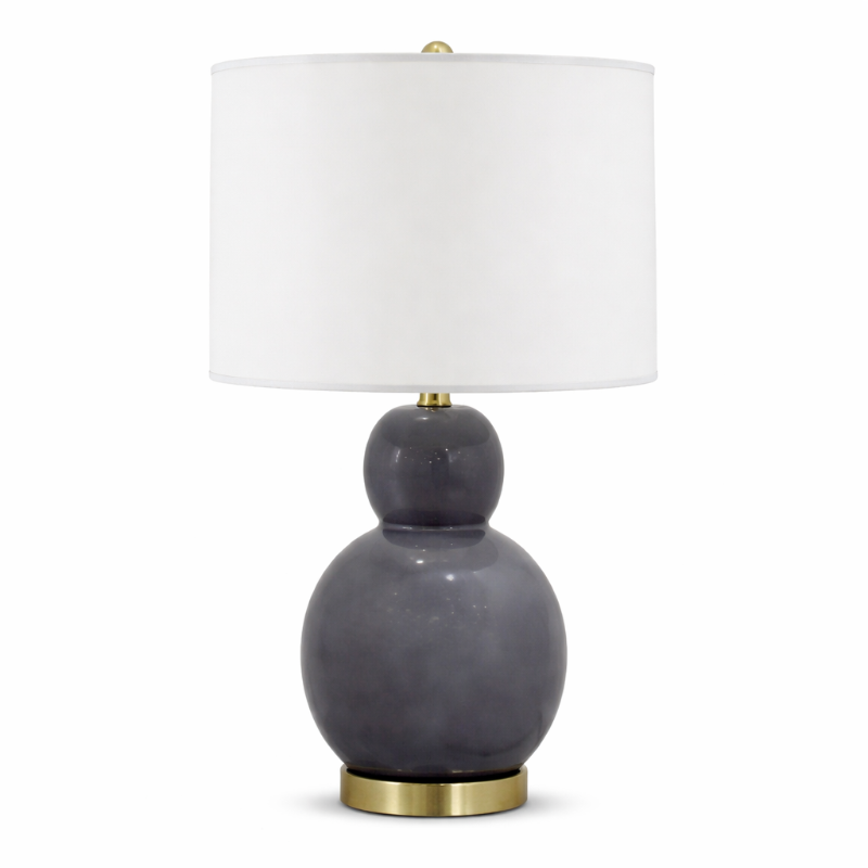 Gray table lamp with a white shade on a white background