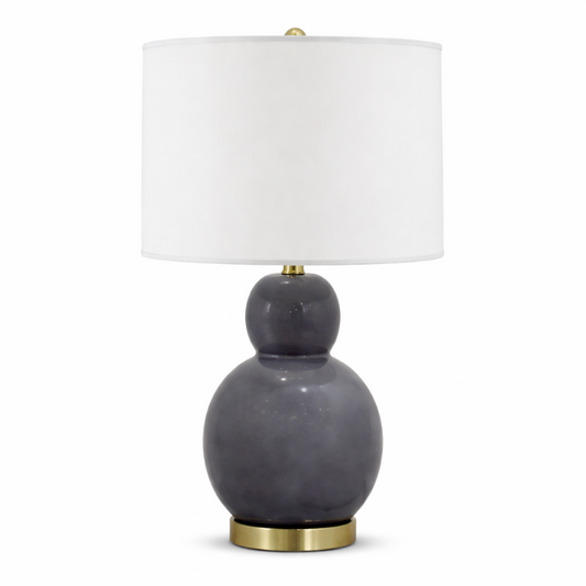 Gray table lamp with a white shade on a white background