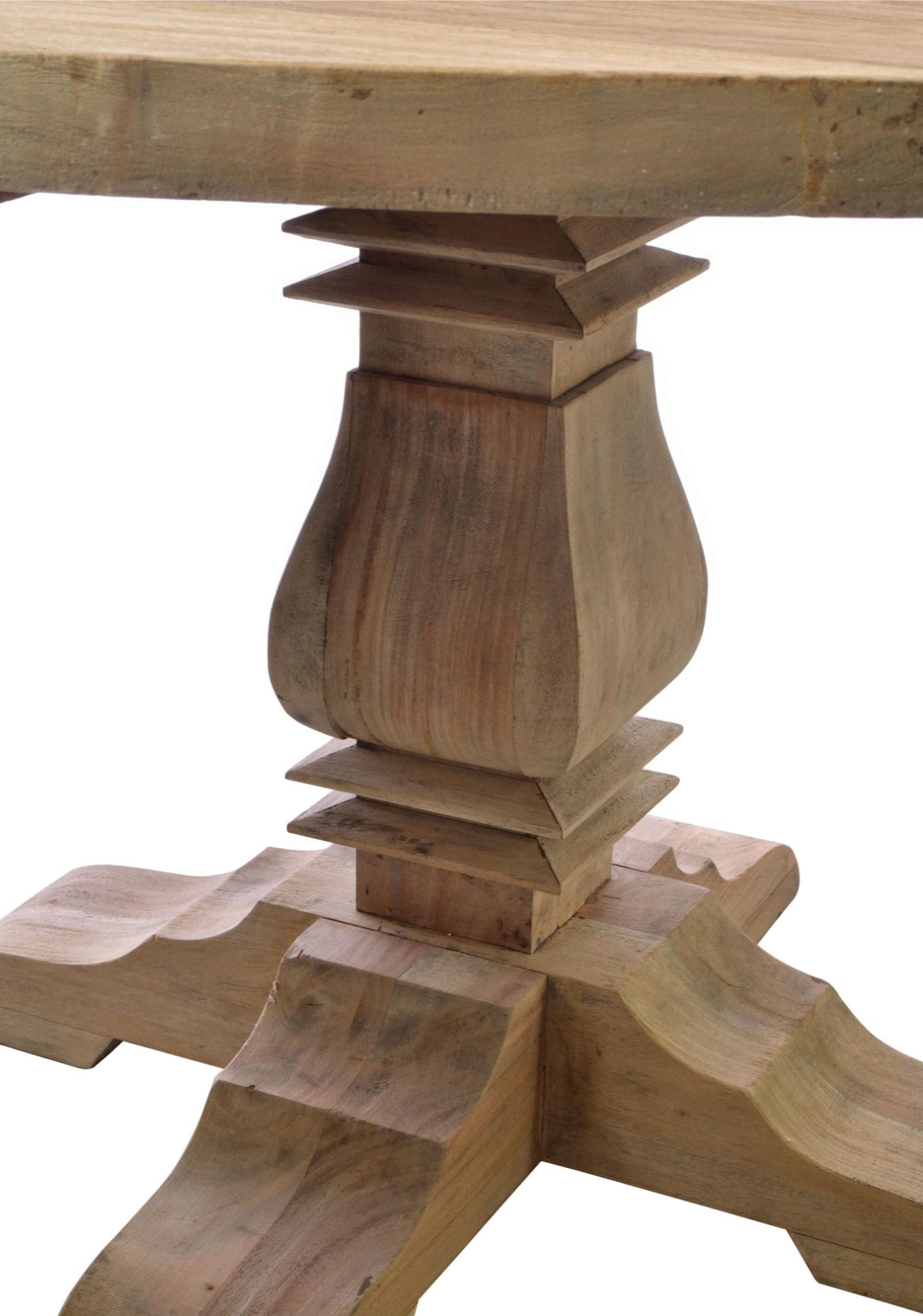 Wooden table with intricate design on a white background