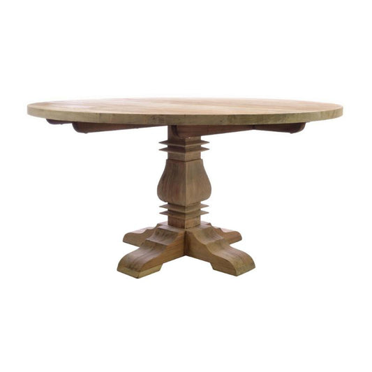 A round wooden dining table with a natural light wood top and a carved pedestal base with four feet, shown on a plain white background.