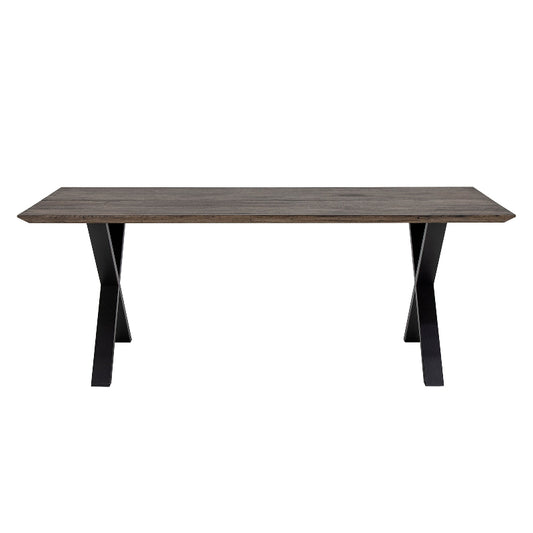 Wooden table with black metal legs on a white background