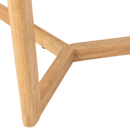 Close-up of a wooden dining table frame on a white background