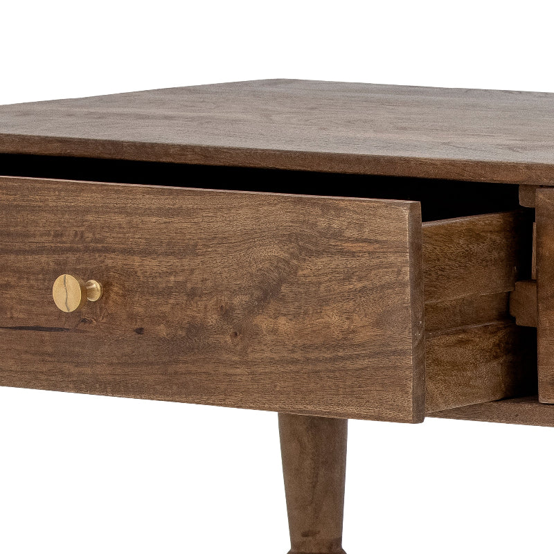 Wooden coffee table with a drawer on a white background