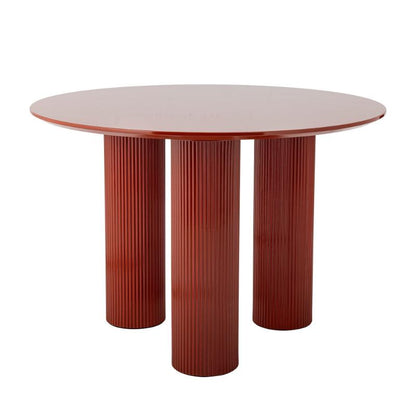 Round table with ribbed cylindrical legs on a white background