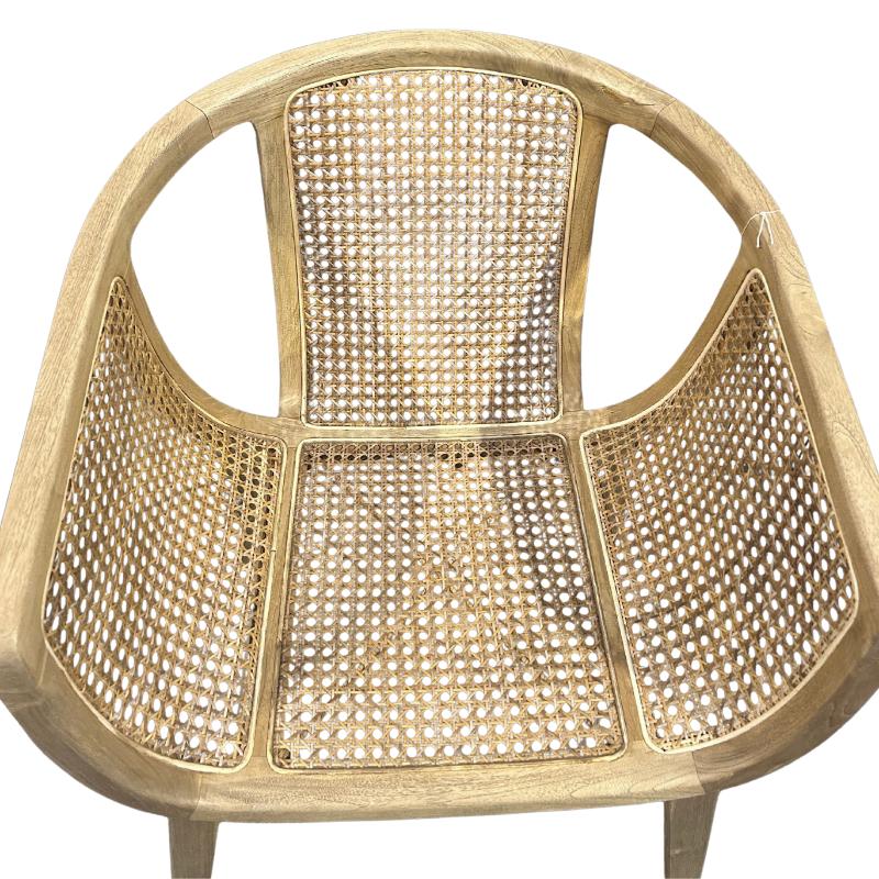 A light natural wood armchair with woven cane backrest and seat panels, shown against a plain white background.