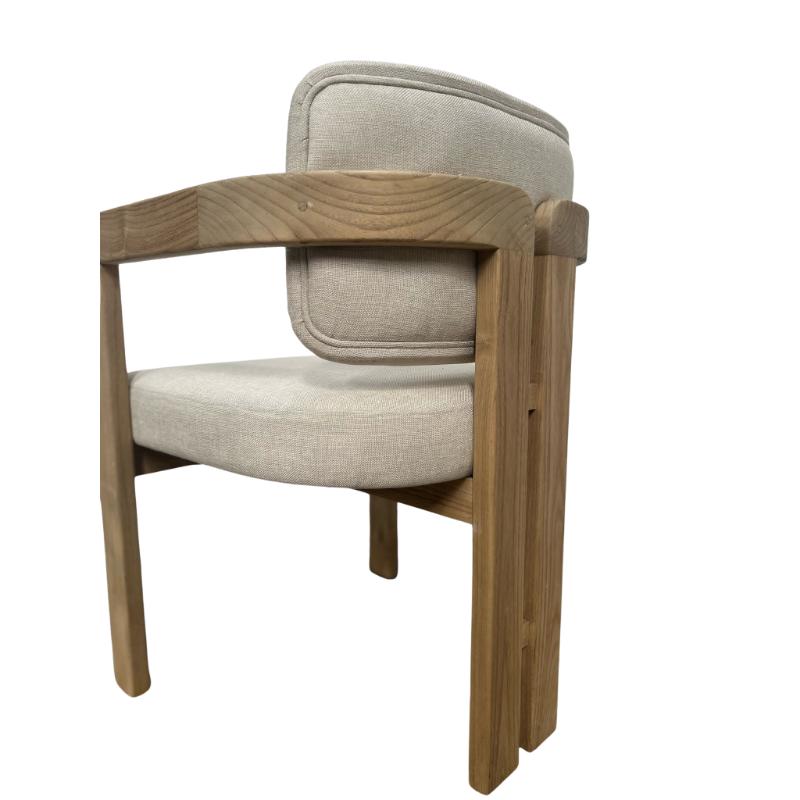 A modern dining chair featuring a light oak wood frame and textured beige fabric upholstery on the seat and backrest, shown against a plain white background.