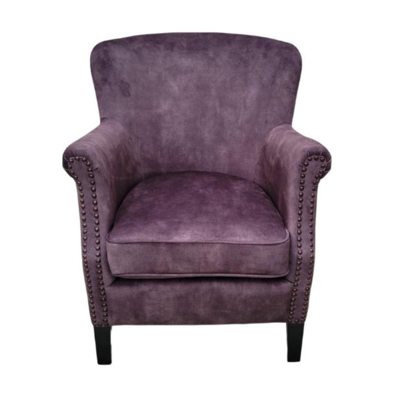 Chrcoal armchair with nailhead trim on a white background