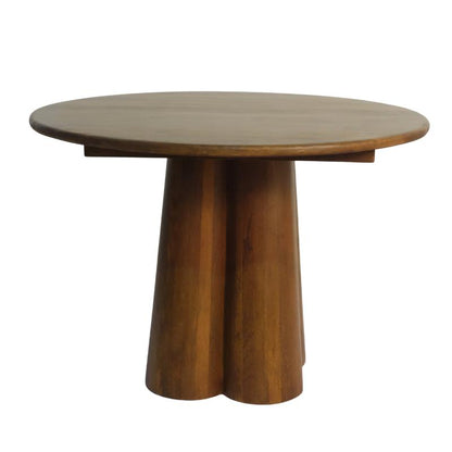 A round wooden table with a thick, sculptural pedestal base made of three flared legs, shown on a plain white background.