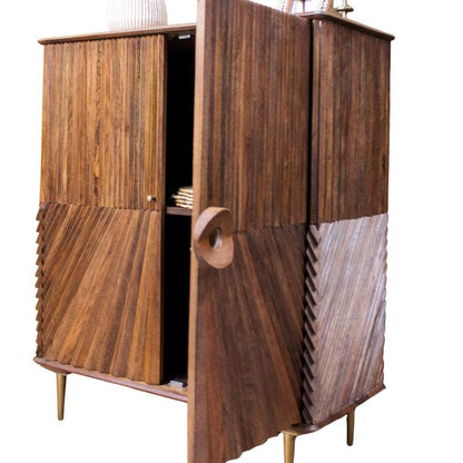 Mid-century modern wooden cabinet with textured chevron and vertical wood grain panels, brass legs, and a round wooden door handle, shown on a white background.