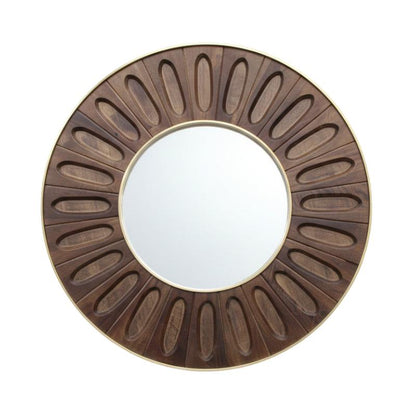 Round wall mirror with a carved sunburst wood frame in a medium-to-dark brown finish and a thin gold-toned outer border, shown on a plain white background.
