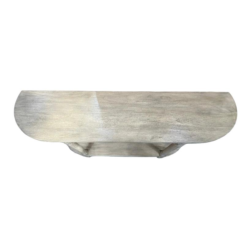 A rustic, weathered gray wooden console table with a curved top and a single shelf, shown against a plain white background.