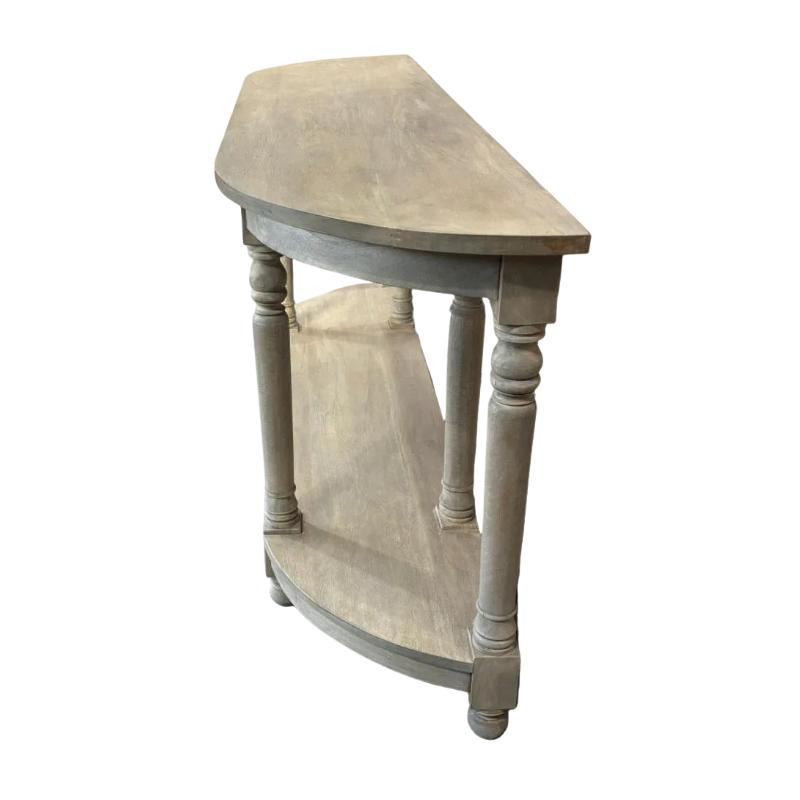 A distressed gray half-circular console table with a single open shelf, featuring turned legs and a weathered wood finish, shown on a plain white background.