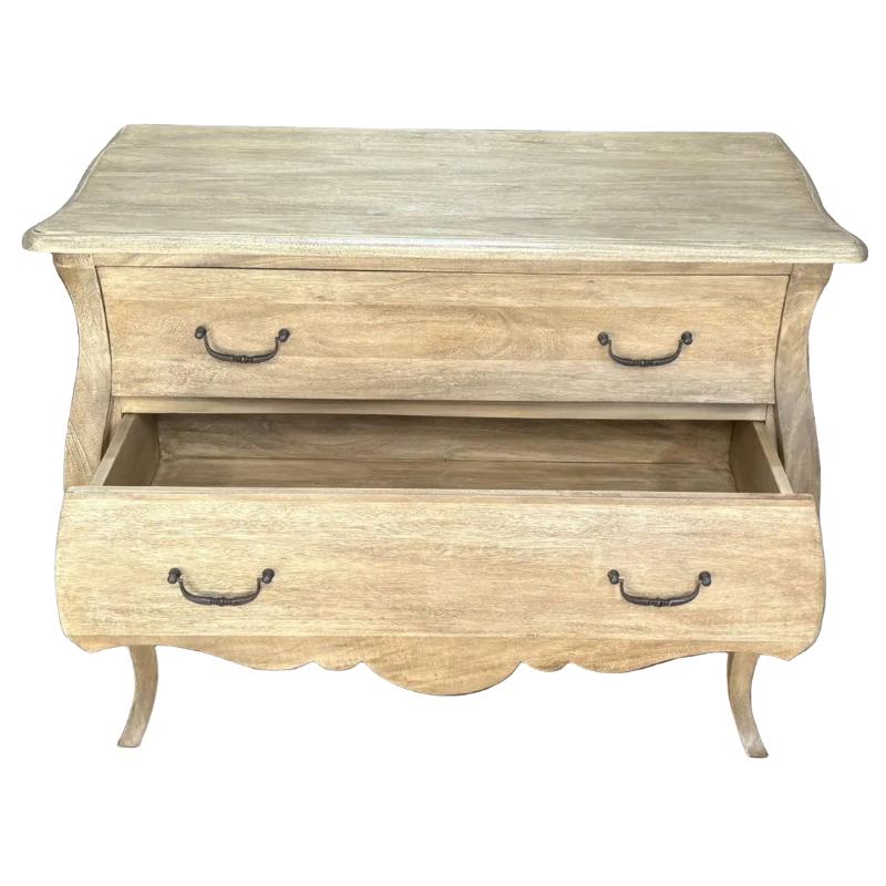 A light natural wood two-drawer nightstand or side table with dark metal drawer pulls, shown with the lower drawer open against a plain white background.