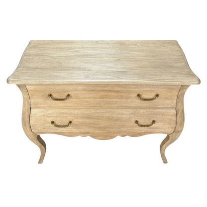 A light beige wood chest of drawers with two curved drawers, brass handles, and cabriole-style legs, shown against a plain white background.
