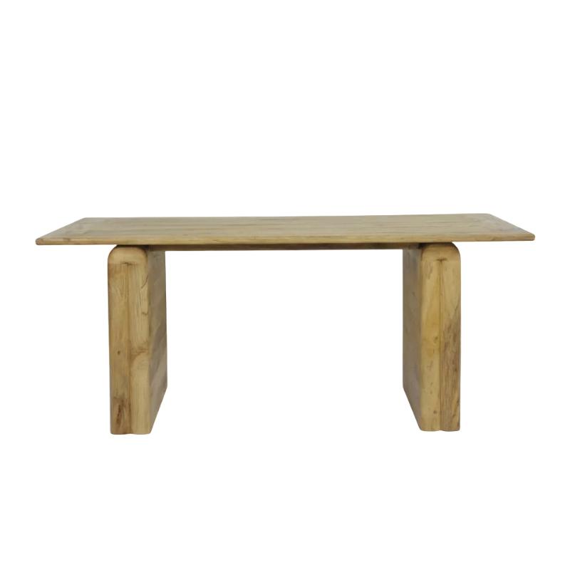 A minimalist wooden table with a rectangular top and two thick, blocky legs, shown against a plain white background.