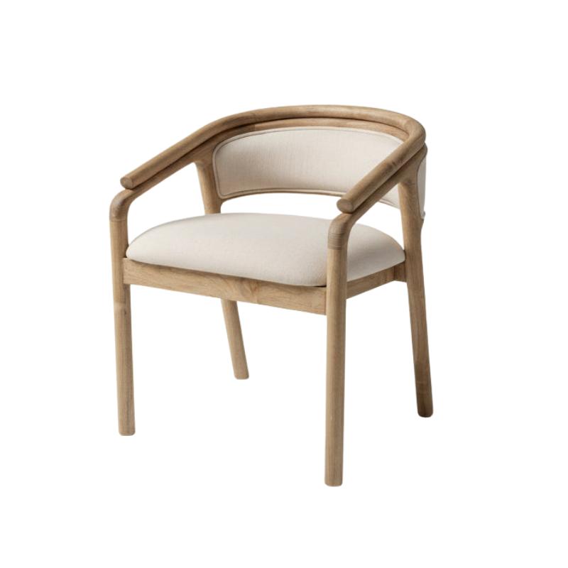 A modern dining chair with a light natural wood frame and curved armrests, featuring cream-colored upholstered seat and back cushions, set against a white background