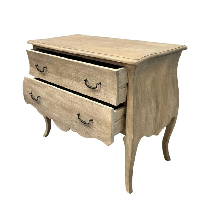 A light natural wood nightstand with two drawers, featuring a curved front, cabriole-style legs, and dark metal handles, shown against a plain white background.