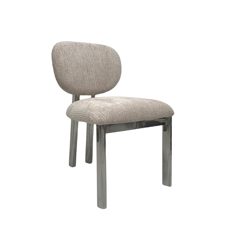 A modern dining chair with a textured light beige fabric upholstered seat and curved backrest, supported by slim polished chrome legs, shown against a plain white background.