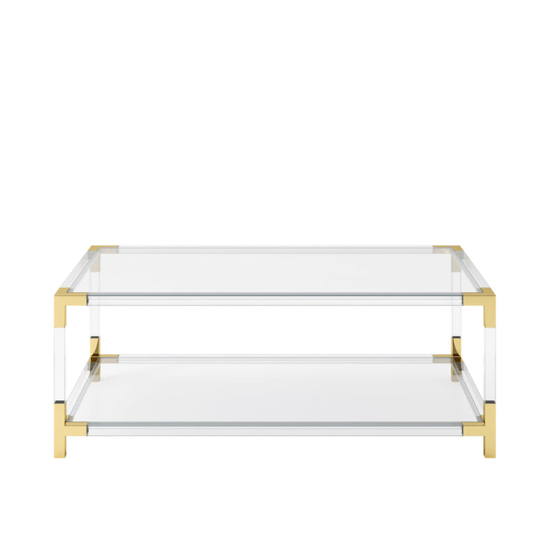 Clear glass coffee table with gold metal frame on a white background