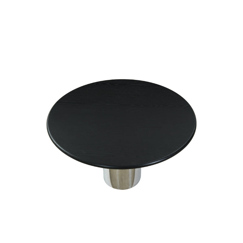 Round black table with a metallic base on a white background