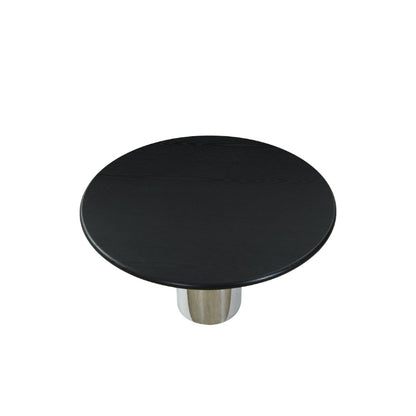 Round black table with a metallic base on a white background