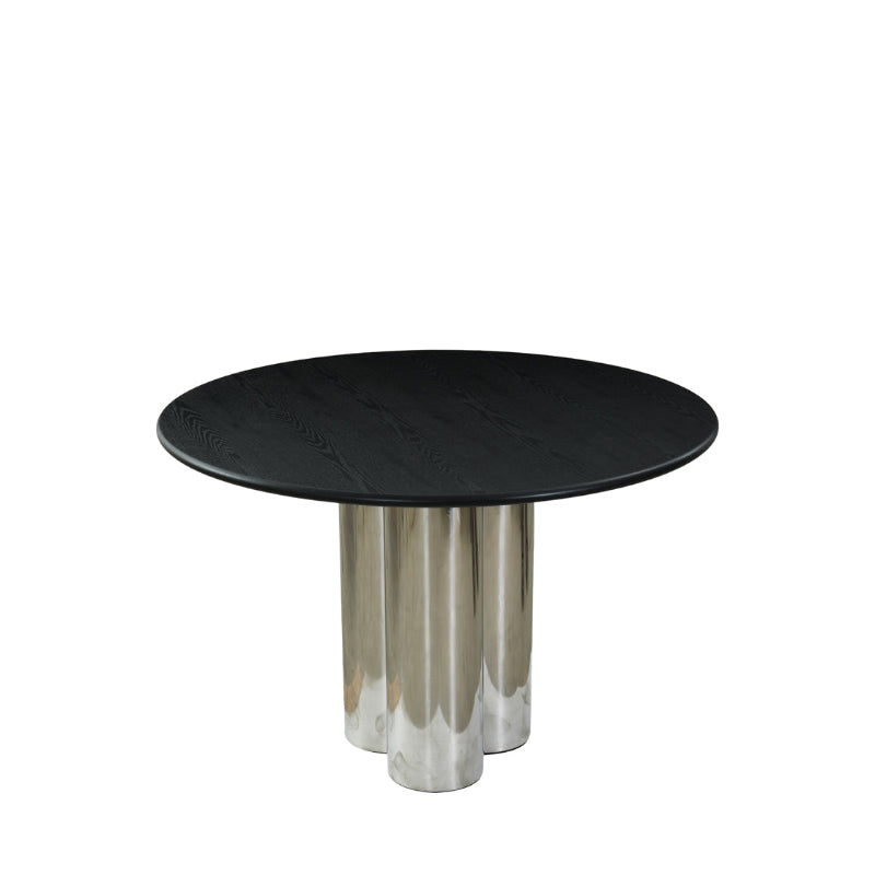 Round black table with metallic base on a white background