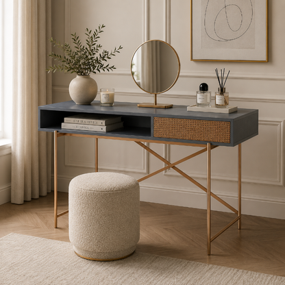 Modern console table with mirror, books, and decorative items in a stylish room.