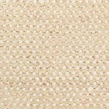Close-up of beige textured fabric
