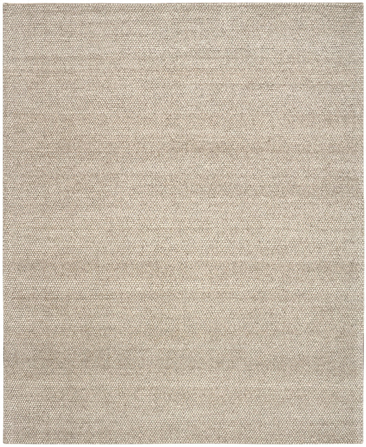 Beige area rug with a subtle pattern on a plain background