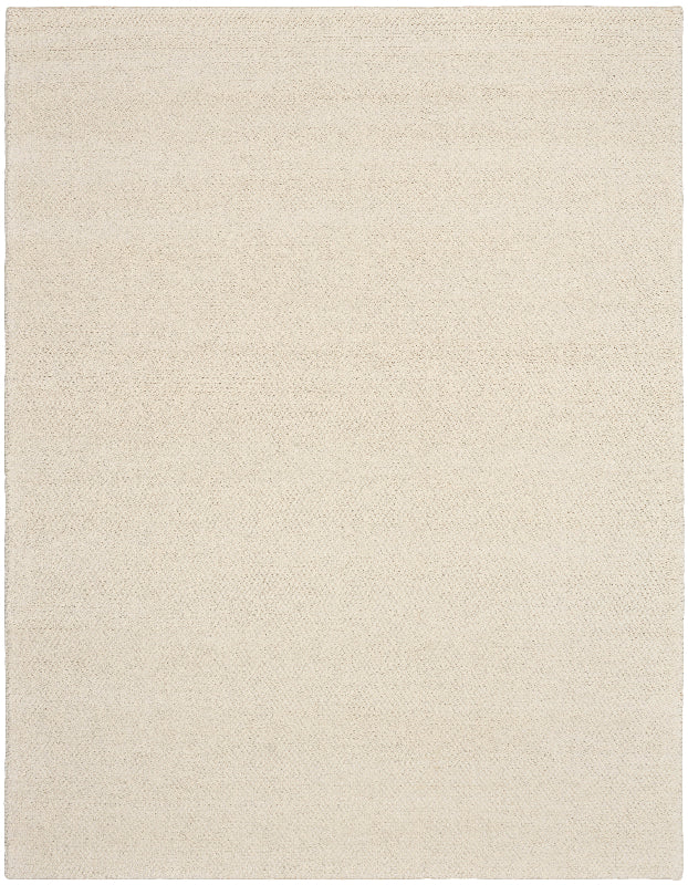 Beige area rug with a subtle pattern on a beige background