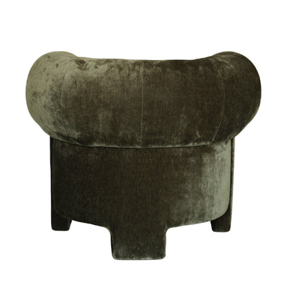 A dark olive green velvet armchair with a rounded, tufted backrest and short legs, shown against a plain white background.