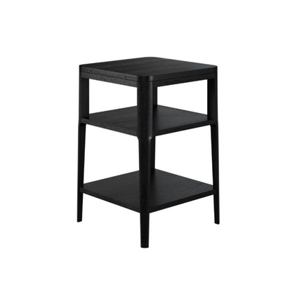 Black three-tiered side table on a white background
