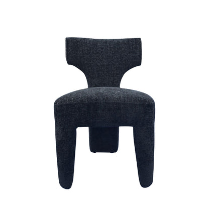 A modern sculptural upholstered chair in a dark textured fabric, shown from the front against a plain white background.