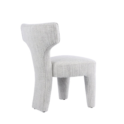 A light gray upholstered accent chair with a sculptural, curved backrest and tapered legs, shown against a plain white background.
