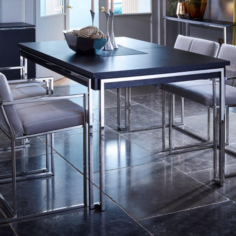 Modern dining table with chairs in a stylish interior setting