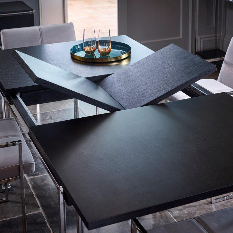 Dining table with extendable feature in a modern kitchen setting