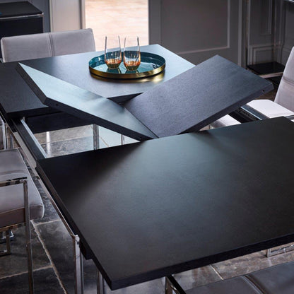 Dining table with extendable feature in a modern kitchen setting