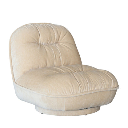 A cream-colored velvet swivel armchair with a tufted backrest and a rounded base, shown against a plain white background.