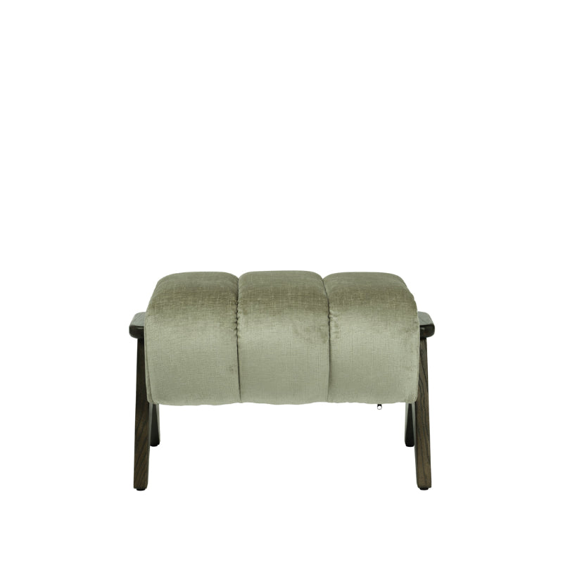 A modern upholstered foot stool with a three-segmented tufted seat cushion in a textured sage green fabric, supported by dark brown wooden legs, shown against a plain white background.