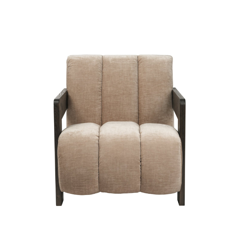 A modern armchair with a segmented, pleated beige fabric upholstery and dark brown wooden arms and legs, shown against a plain white background.