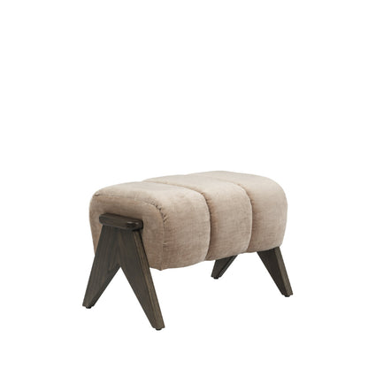 A modern upholstered foot stool with a padded beige fabric seat and dark brown angled wooden legs, shown against a plain white background.