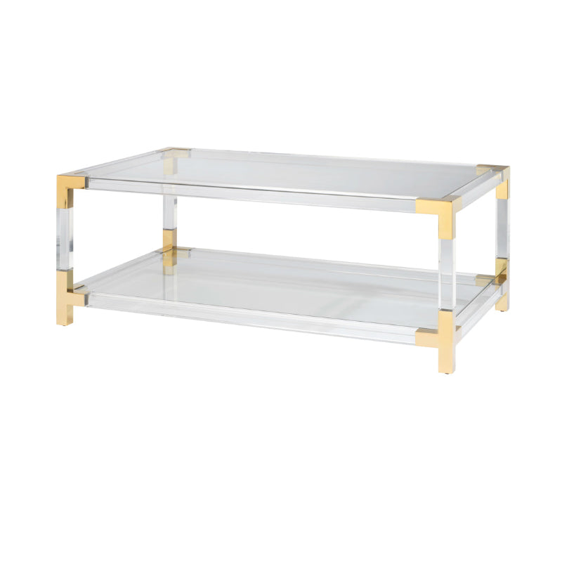 Acrylic coffee table with gold accents on a white background