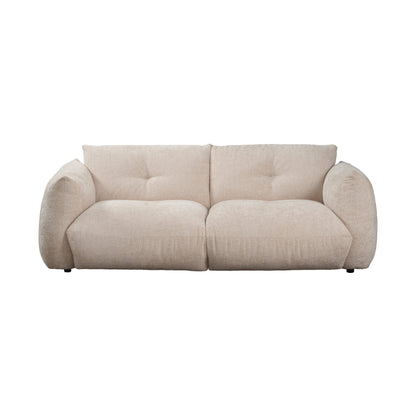 Neutral low profile sofa on a white background