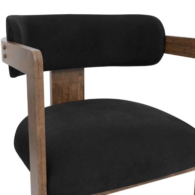 Chair with black cushioned seat and backrest on a white background