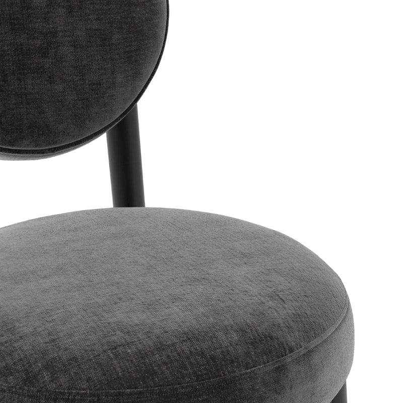 Gray upholstered chair with a white background