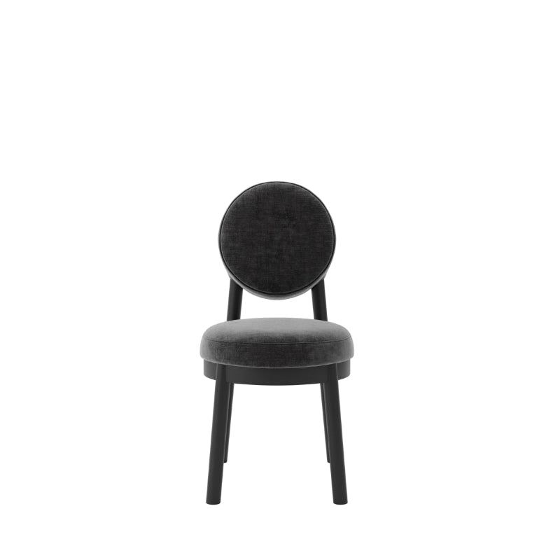 A modern dining chair with a dark gray velvet upholstered seat and a circular backrest, supported by a black wooden frame, shown against a plain white background.