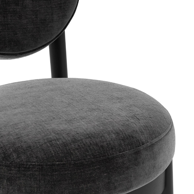Gray upholstered chair with a black metal frame on a white background