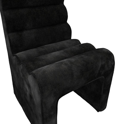 Black chair with a textured surface on a white background
