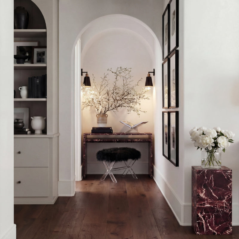 Modern interior design with marble accents and decorative elements.